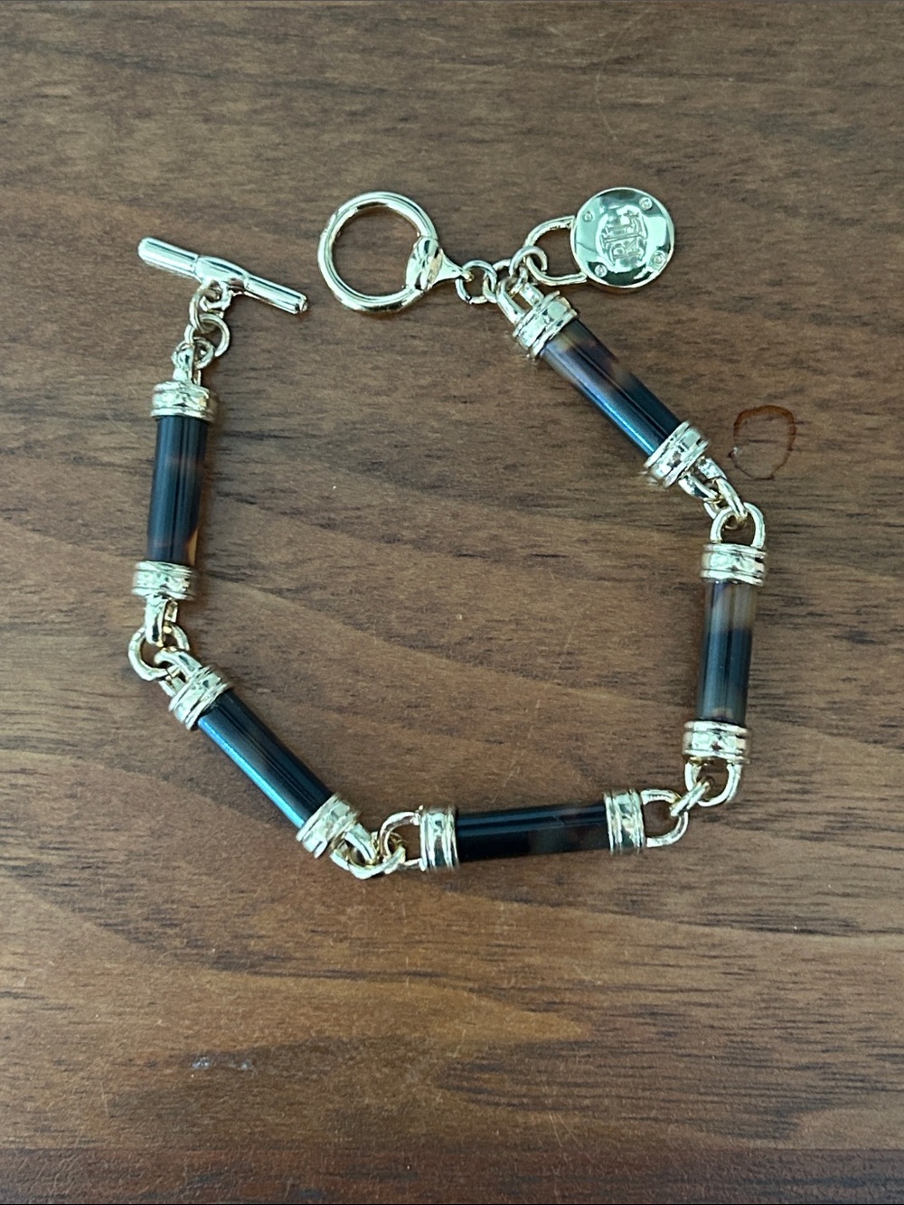 Gold Toned Bracelet with Dark Brown Tube Links
